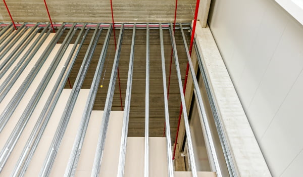 Men working construction indoors